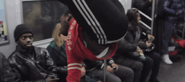 Subway dancer swinging daps fist bump